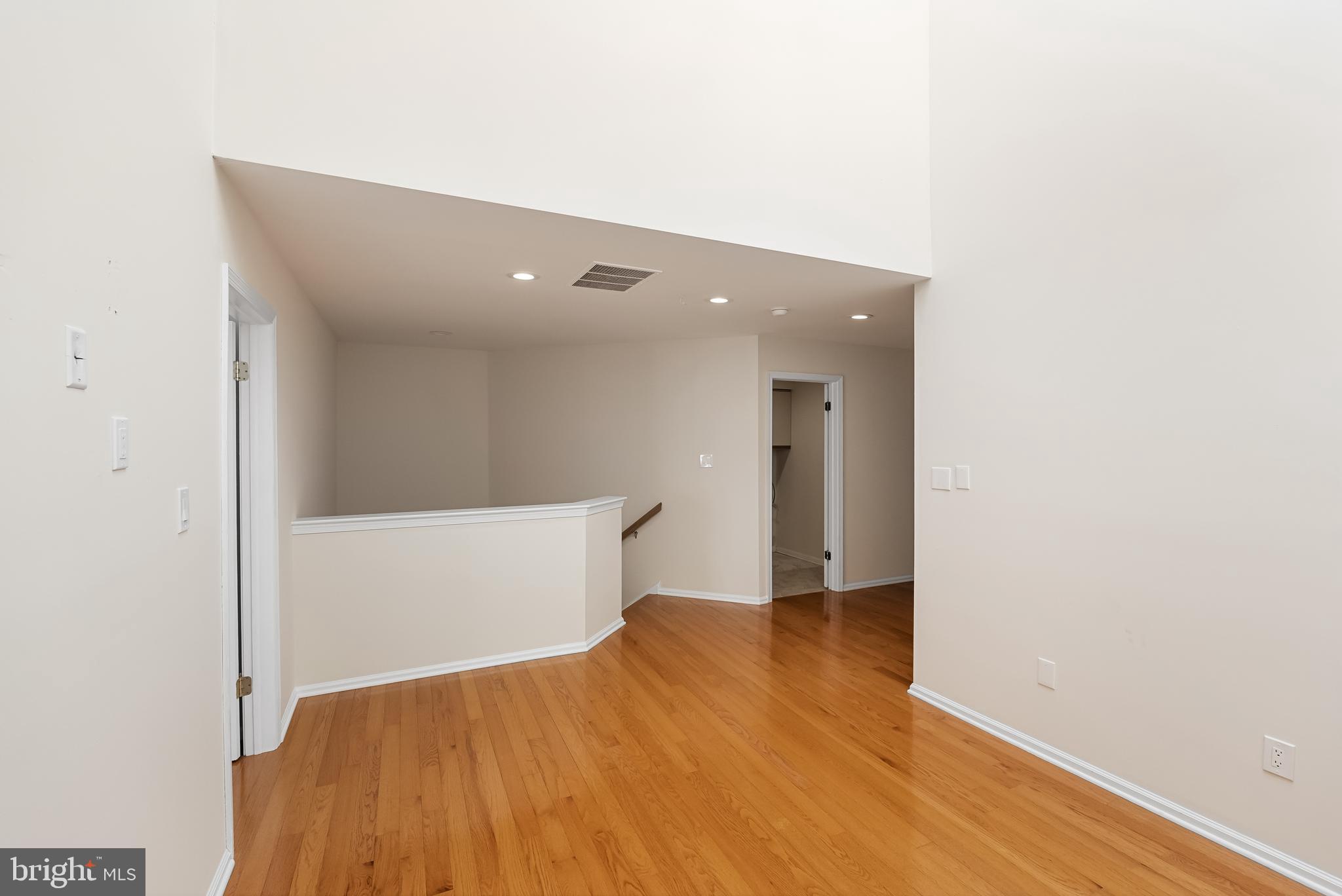 962 Chanticleer Cherry Hill, NJ 08003 - Photo 23 of 38 a view of a big room with wooden floor and cabinet