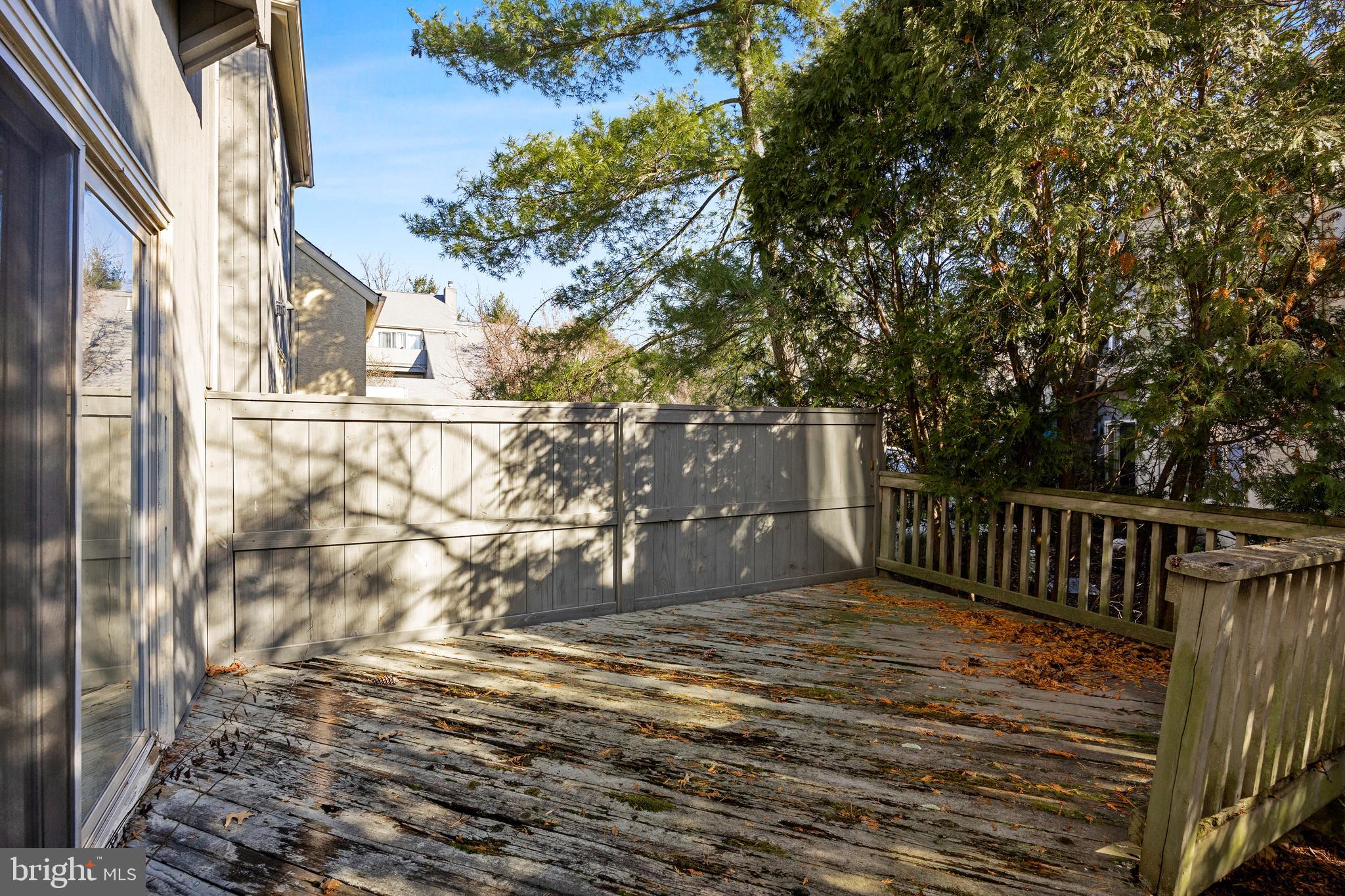 962 Chanticleer Cherry Hill, NJ 08003 - Photo 37 of 38 a view of a yard with wooden fence