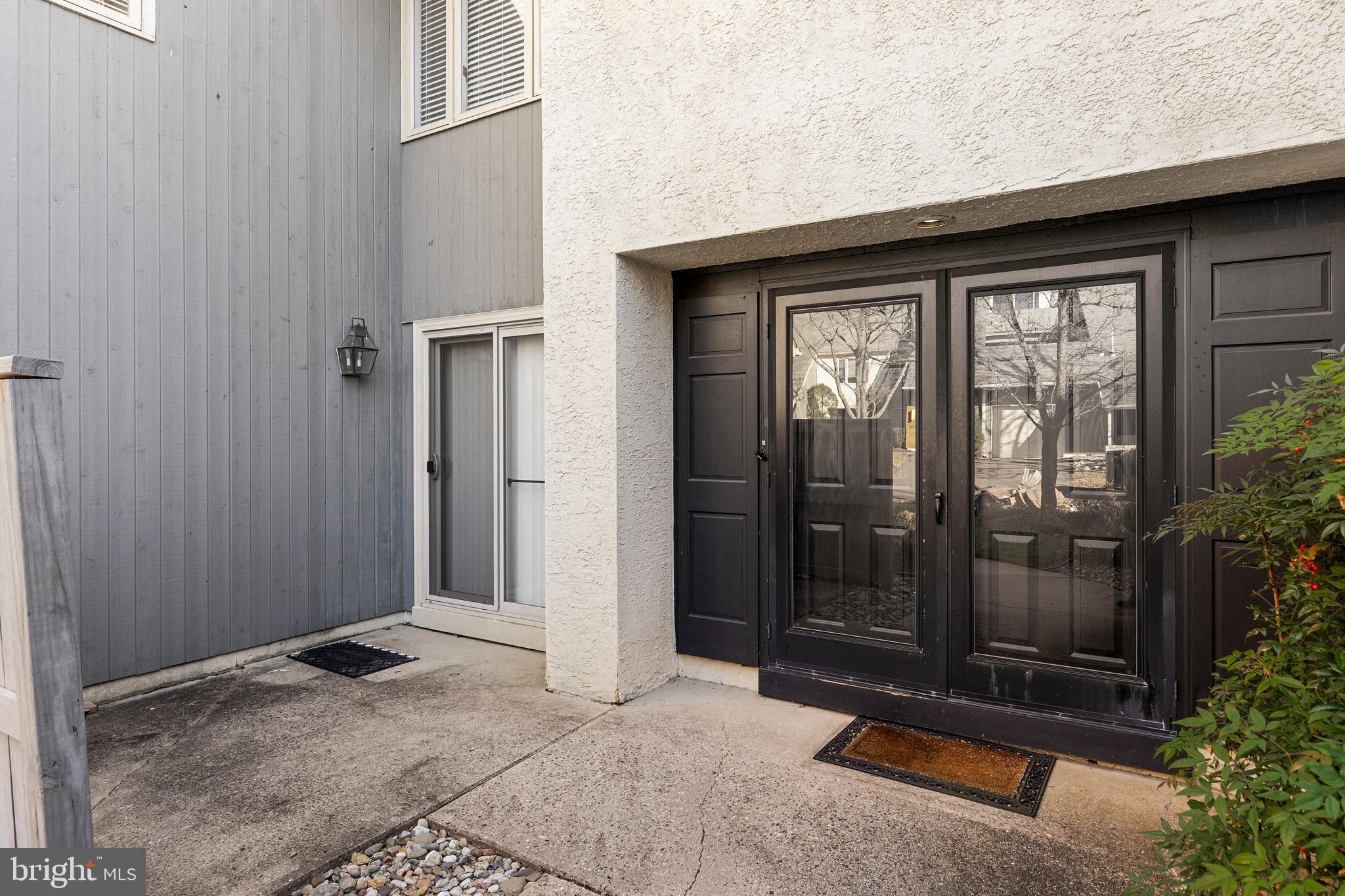 962 Chanticleer Cherry Hill, NJ 08003 - Photo 4 of 38 a backyard of a house with potted plants