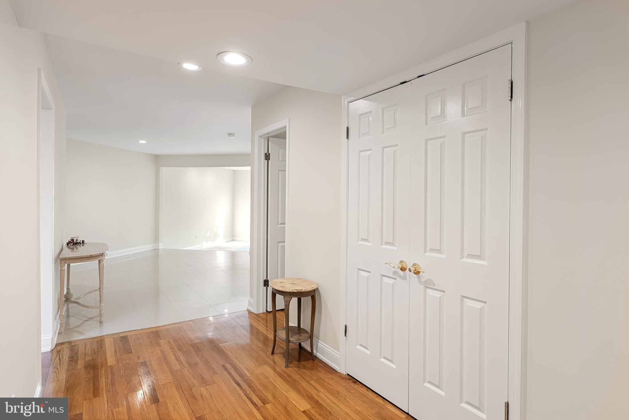 962 Chanticleer Cherry Hill, NJ 08003 - Photo 6 of 38 a view of bathroom with a sink wooden floor and a shower