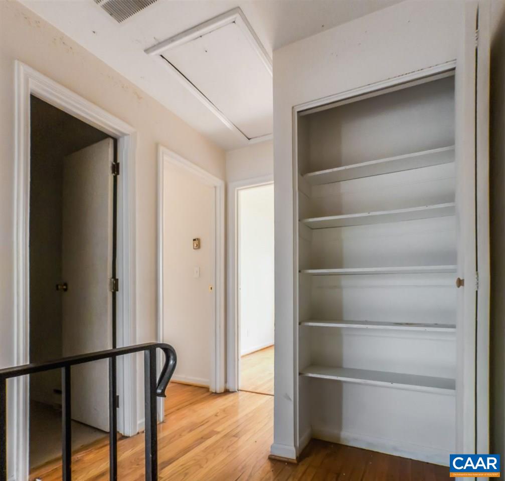 604 Bailey Road Charlottesville, VA 22903 - Photo 17 of 34 a view of walk in closet with empty racks