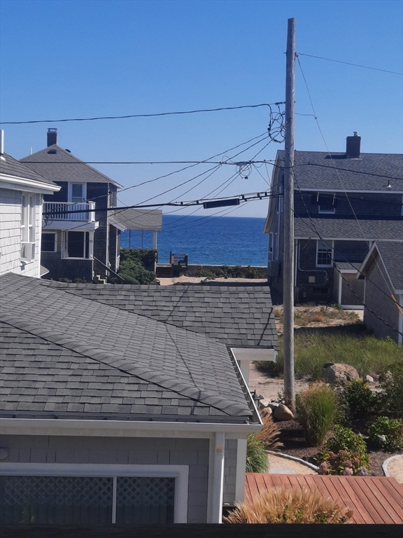 21 Manchester Street, Unit 21 Scituate, MA 02066 - Photo 2 of 11 a front view of a house with garden