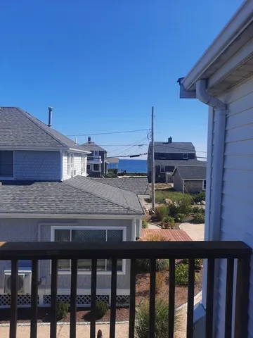 a terrace view with sitting space and balcony