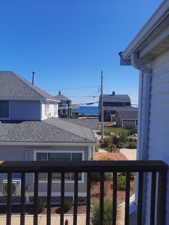 21 Manchester Street, Unit 21 Scituate, MA 02066 - Photo 3 of 11 a terrace view with sitting space and balcony