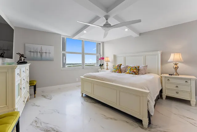 a bed room with a bed and a dresser