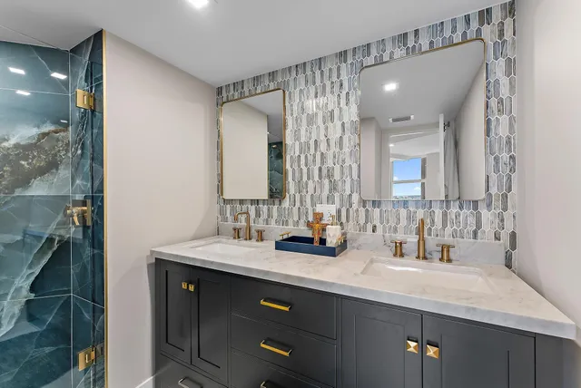 a bathroom with a double vanity sink and a mirror