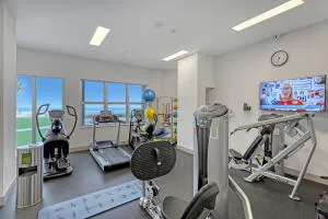 a view of a room with gym equipment