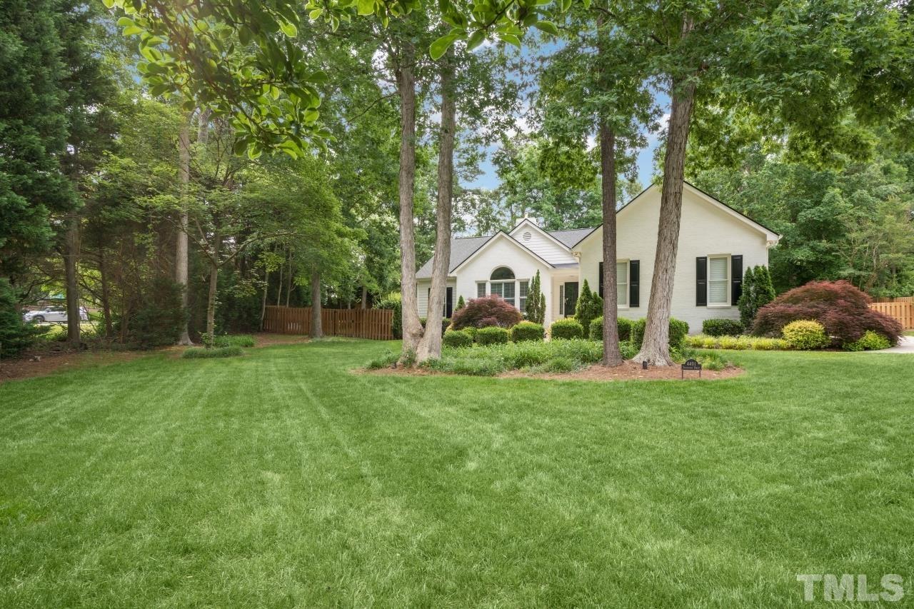 4401 Touchstone Forest Road Raleigh, NC 27612 - Photo 2 of 44 a view of a house with backyard and sitting area