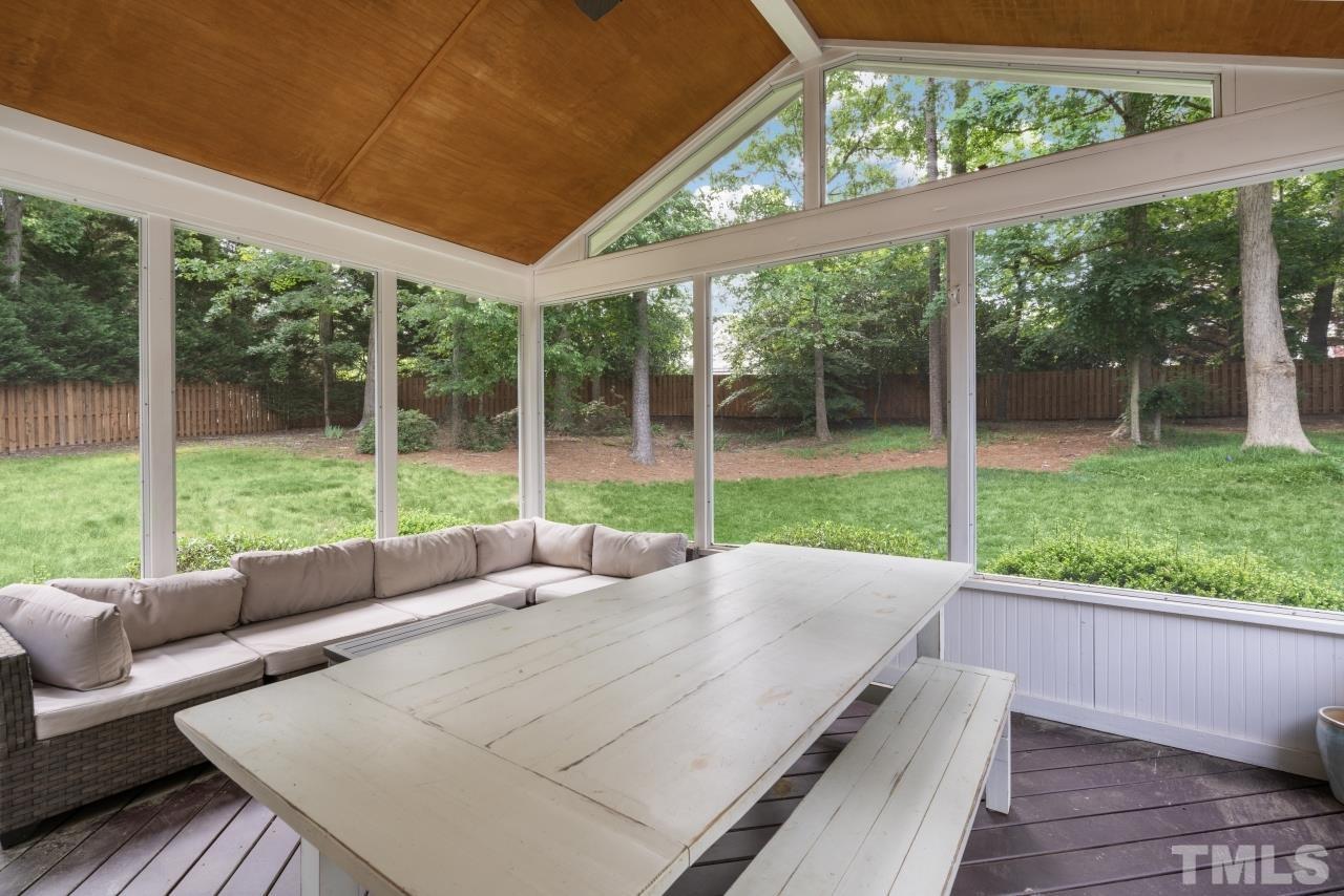 4401 Touchstone Forest Road Raleigh, NC 27612 - Photo 26 of 44 a view of a patio with couches plants and garden