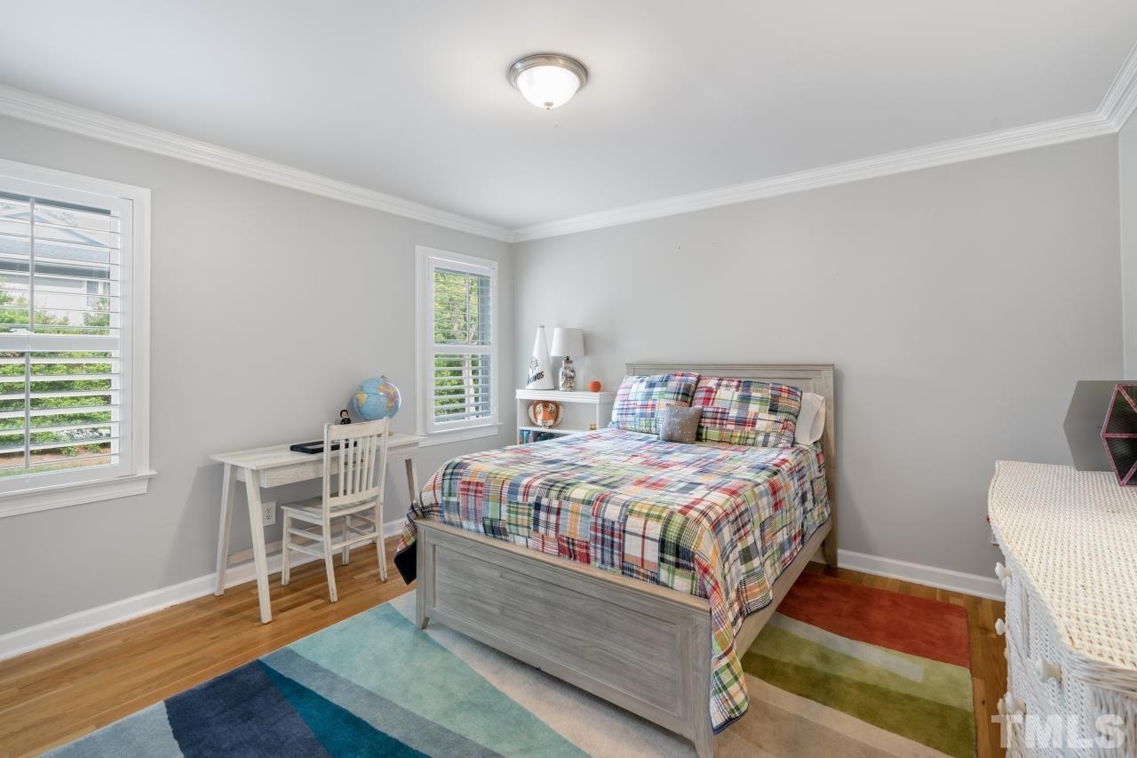 4401 Touchstone Forest Road Raleigh, NC 27612 - Photo 28 of 44 a bedroom with a bed and a window
