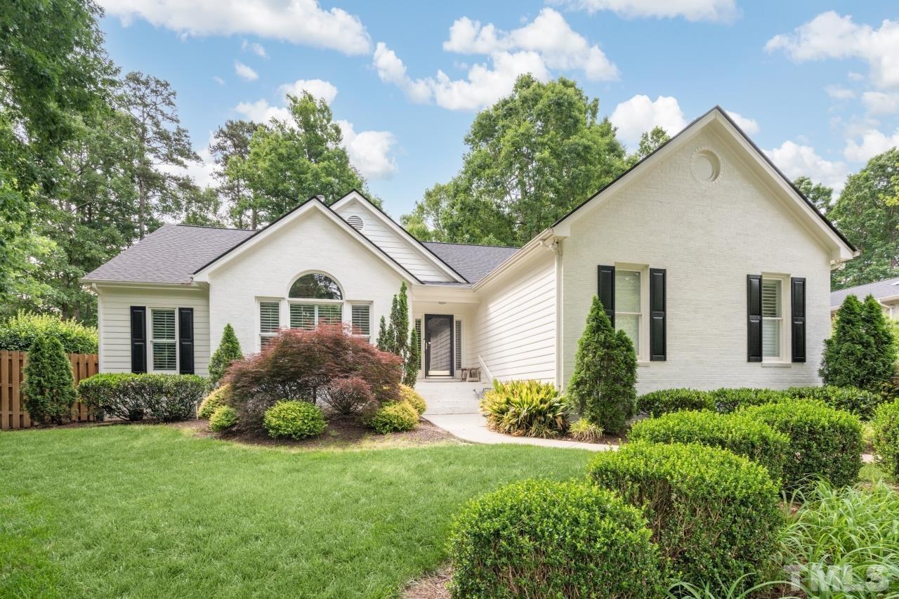 4401 Touchstone Forest Road Raleigh, NC 27612 - Photo 3 of 44 a front view of house with a garden