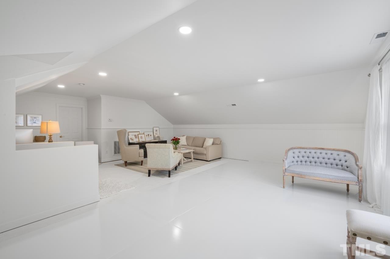 4401 Touchstone Forest Road Raleigh, NC 27612 - Photo 32 of 44 a living room with furniture