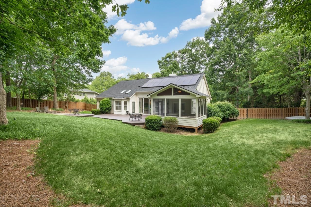 4401 Touchstone Forest Road Raleigh, NC 27612 - Photo 34 of 44 a view of a house with a yard
