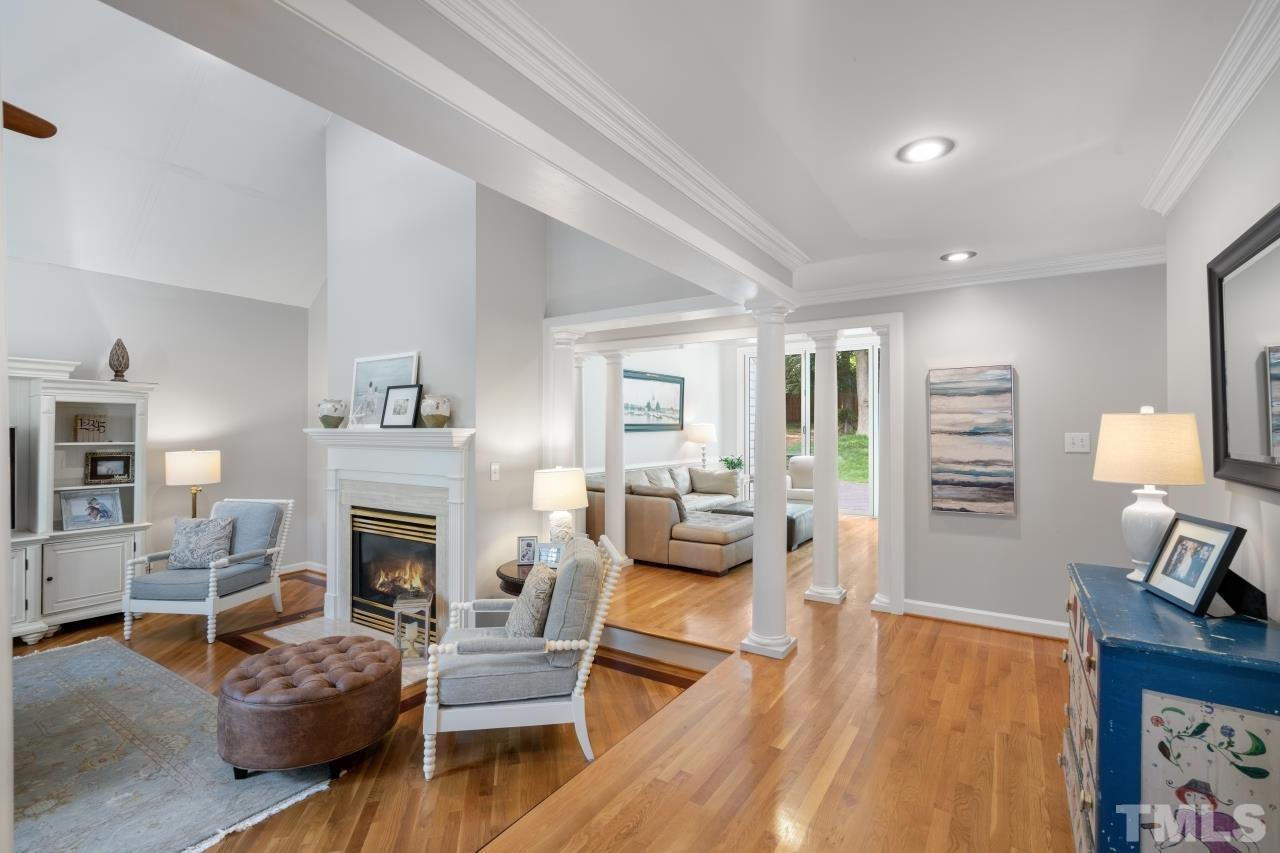 4401 Touchstone Forest Road Raleigh, NC 27612 - Photo 4 of 44 a living room with furniture and a fireplace