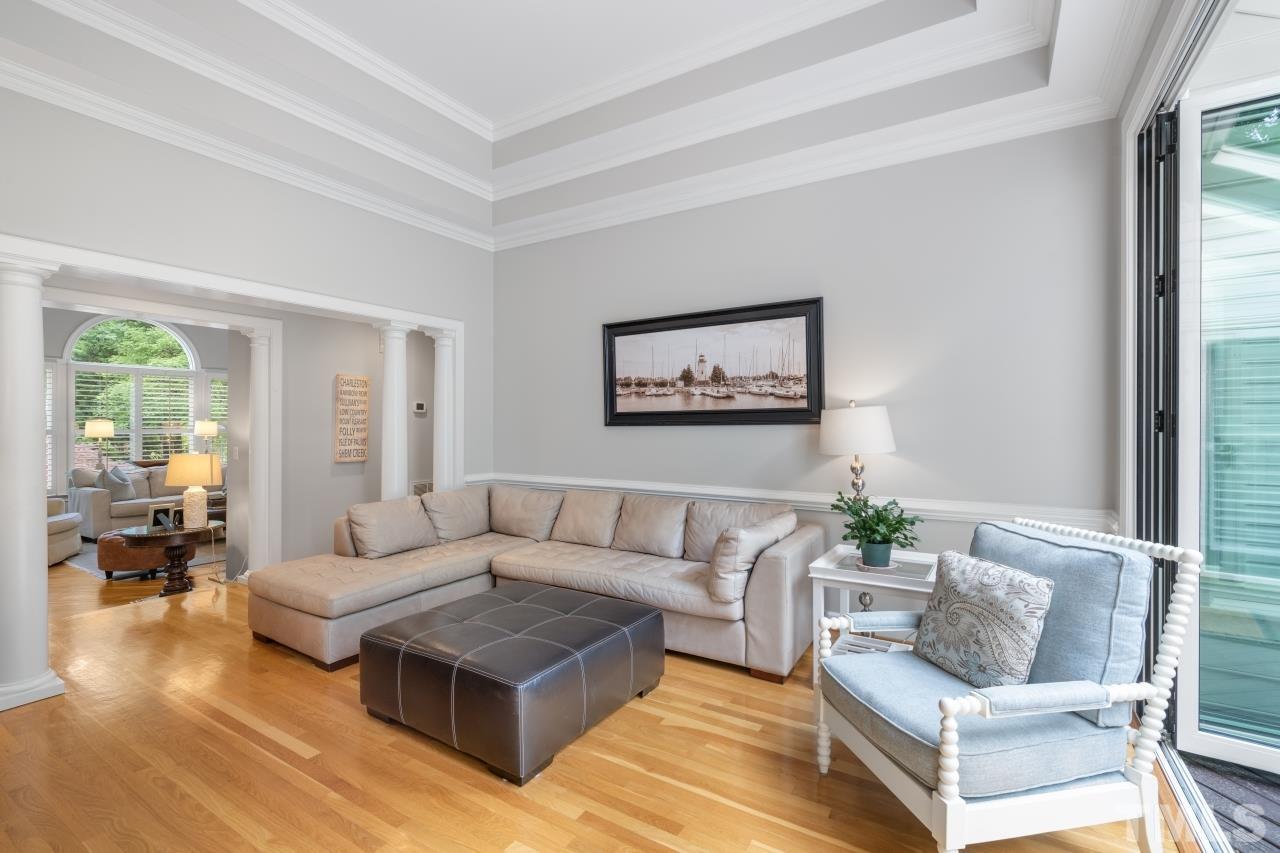 4401 Touchstone Forest Road Raleigh, NC 27612 - Photo 10 of 44 a living room with furniture and a large window