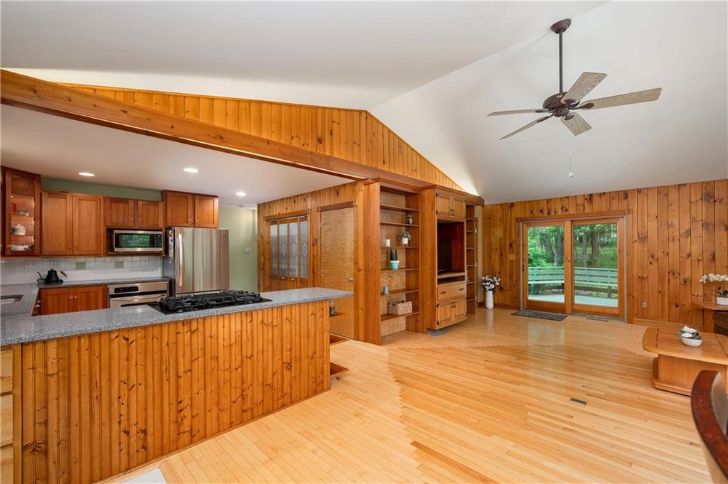 223 Cashdollar Road Mars, PA 16046 - Photo 13 of 42 a large kitchen with stainless steel appliances wooden floor and large windows