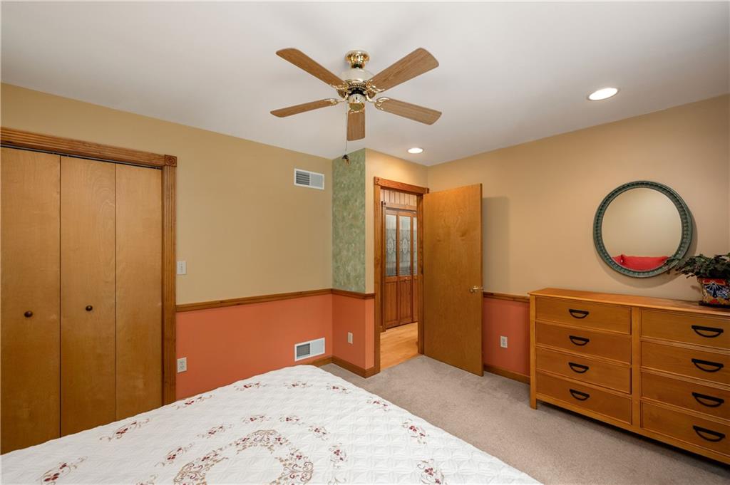 223 Cashdollar Road Mars, PA 16046 - Photo 24 of 42 a bedroom with a bed and a dresser