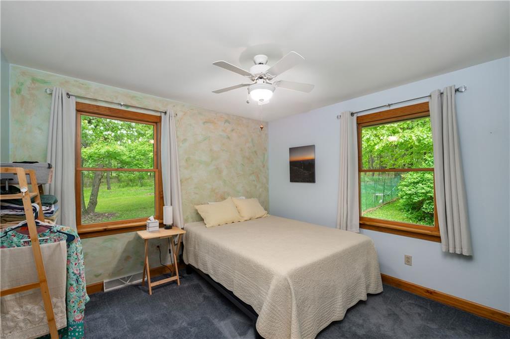 223 Cashdollar Road Mars, PA 16046 - Photo 25 of 42 a bedroom with a bed and a window