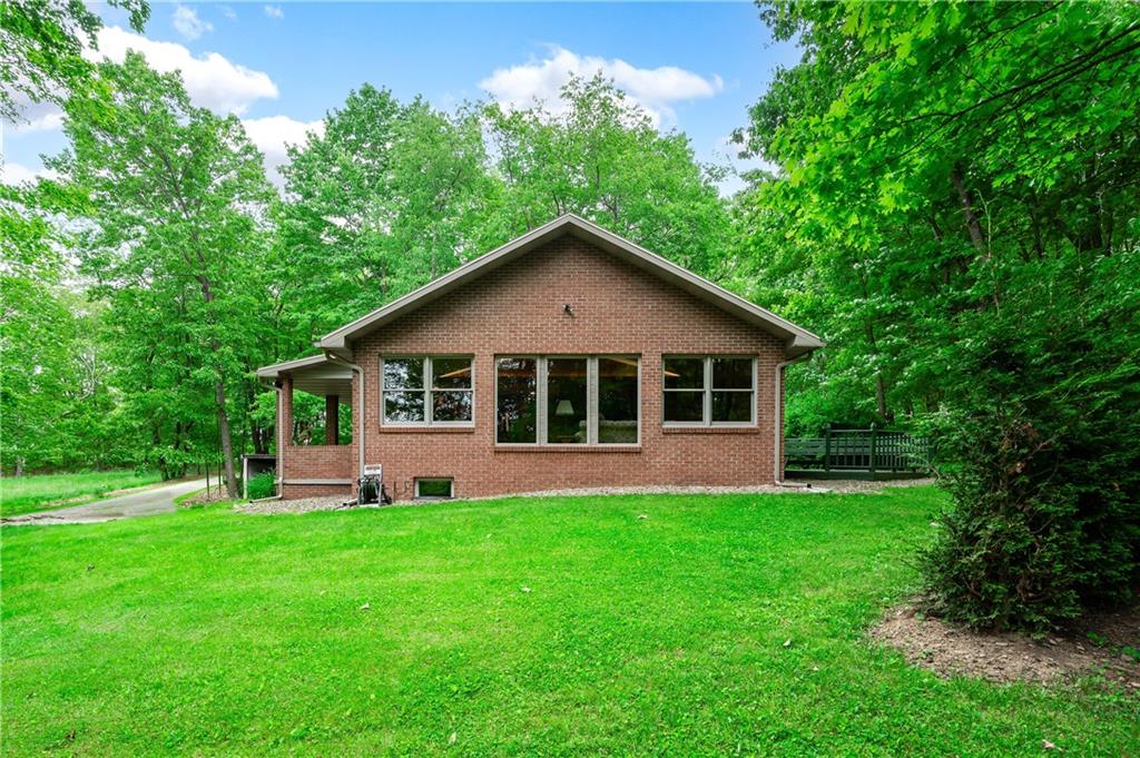 223 Cashdollar Road Mars, PA 16046 - Photo 32 of 42 a house that is sitting in the grass