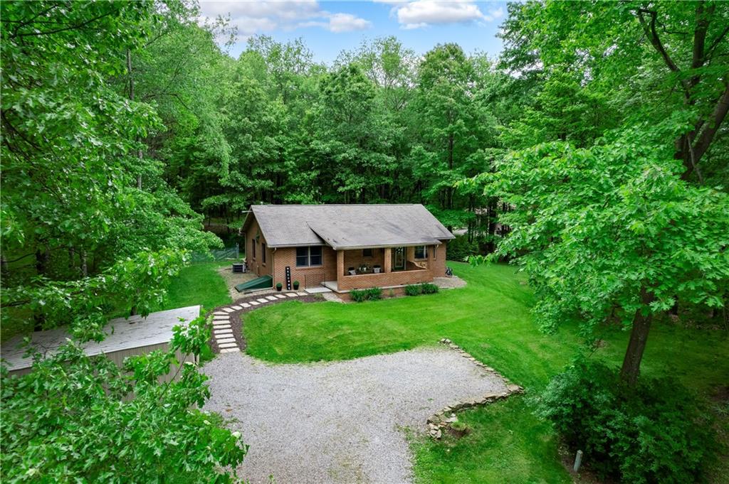 223 Cashdollar Road Mars, PA 16046 - Photo 6 of 42 a view of a house with a yard and large trees