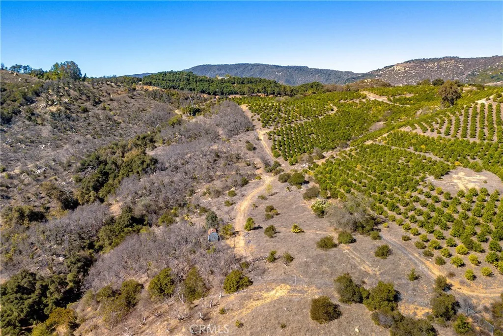 34 Los Gatos Road Temecula, CA 92590 - Photo 4 of 11 a view of a field with mountains in the background