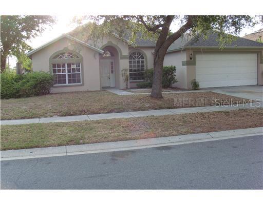 2025 Bell Ranch Street Brandon, FL 33511 - Photo 1 of 1 a front view of a house with a yard