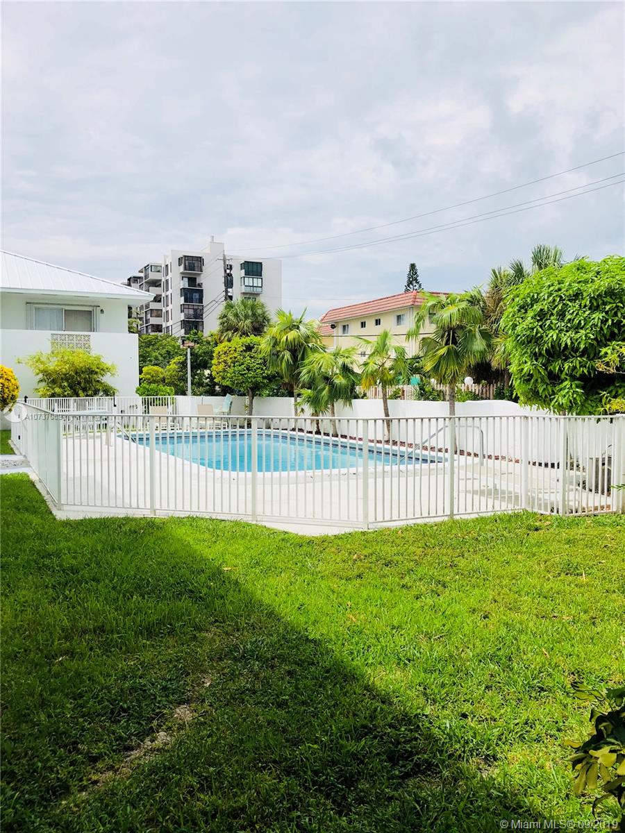 201 Sunrise Drive, Unit 109 Key Biscayne, FL 33149 - Photo 14 of 14 a view of a fence