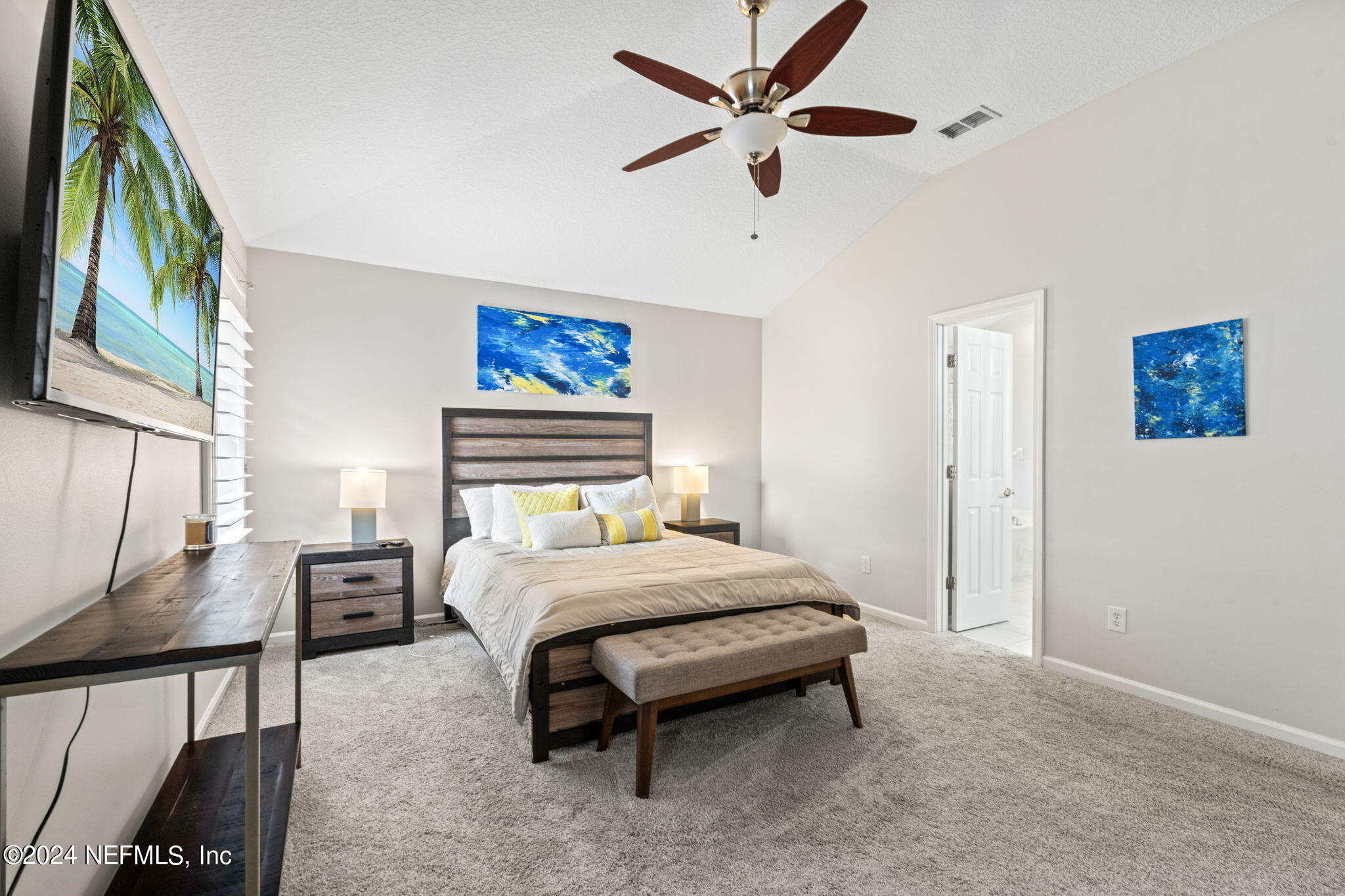 4301 Rye Court St. Johns, FL 32259 - Photo 20 of 47 a bedroom with a bed and a chandelier