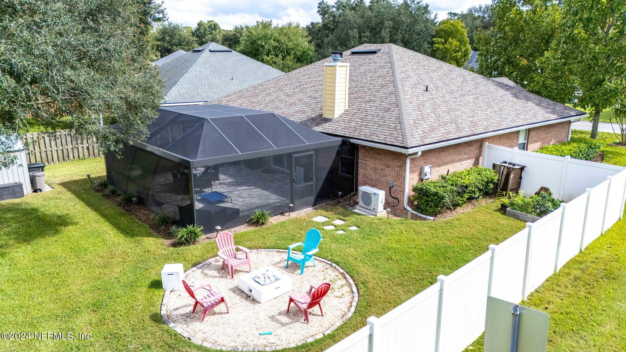 4301 Rye Court St. Johns, FL 32259 - Photo 46 of 47 a aerial view of a house with table and chairs potted plants