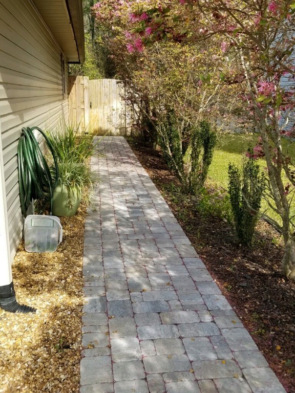 86279 Fortune Drive Yulee, FL 32097 - Photo 2 of 5 a view of a pathway with plants