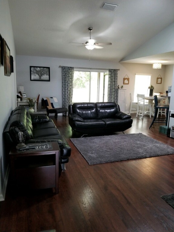 86279 Fortune Drive Yulee, FL 32097 - Photo 3 of 5 a living room with furniture and a fireplace
