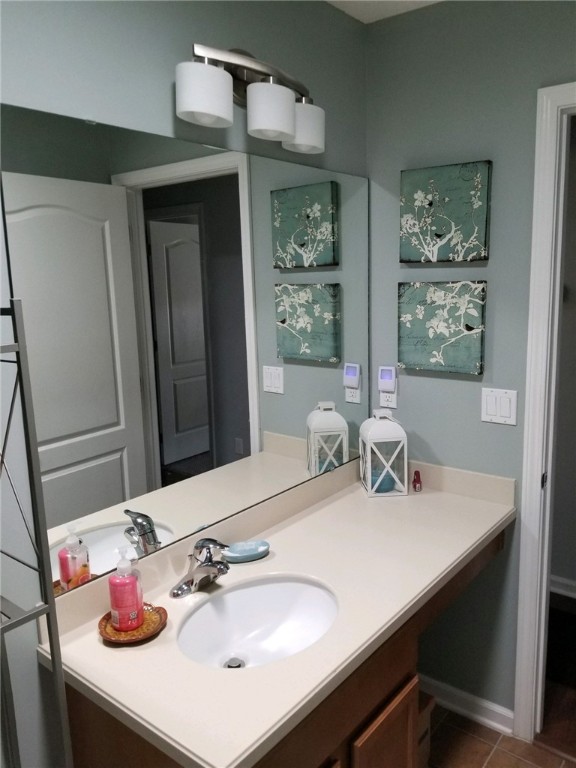 86279 Fortune Drive Yulee, FL 32097 - Photo 4 of 5 a bathroom with a sink and a mirror