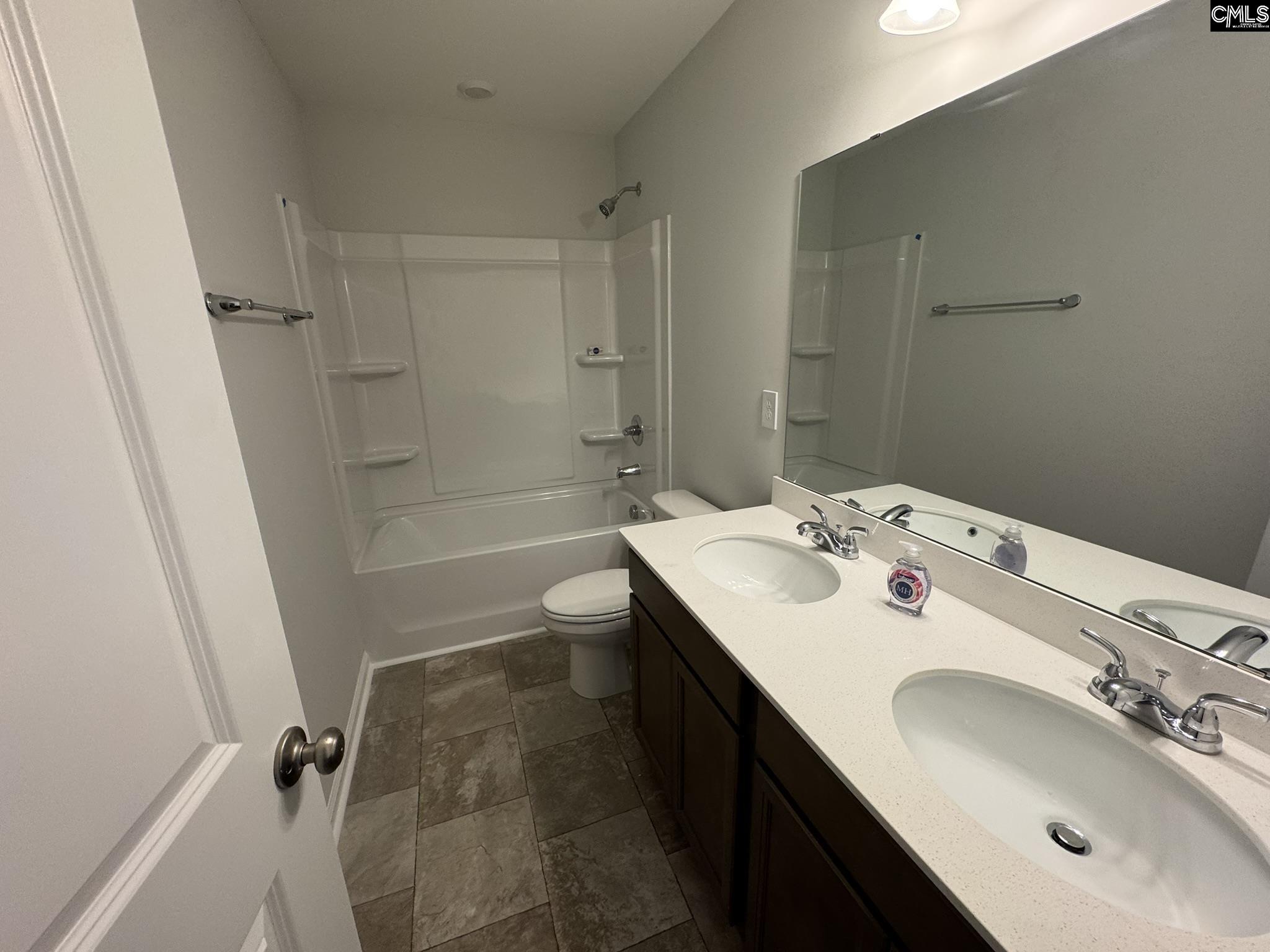 6023 Edgemont Court Elgin, SC 29045 - Photo 8 of 15 a bathroom with a sink a toilet and shower