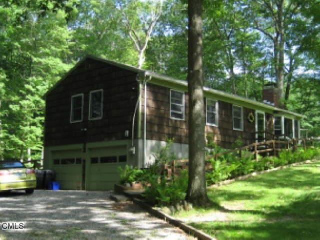 7 Cheyenne Road Oxford, CT 06478 - Photo 1 of 1 a view of a house with backyard
