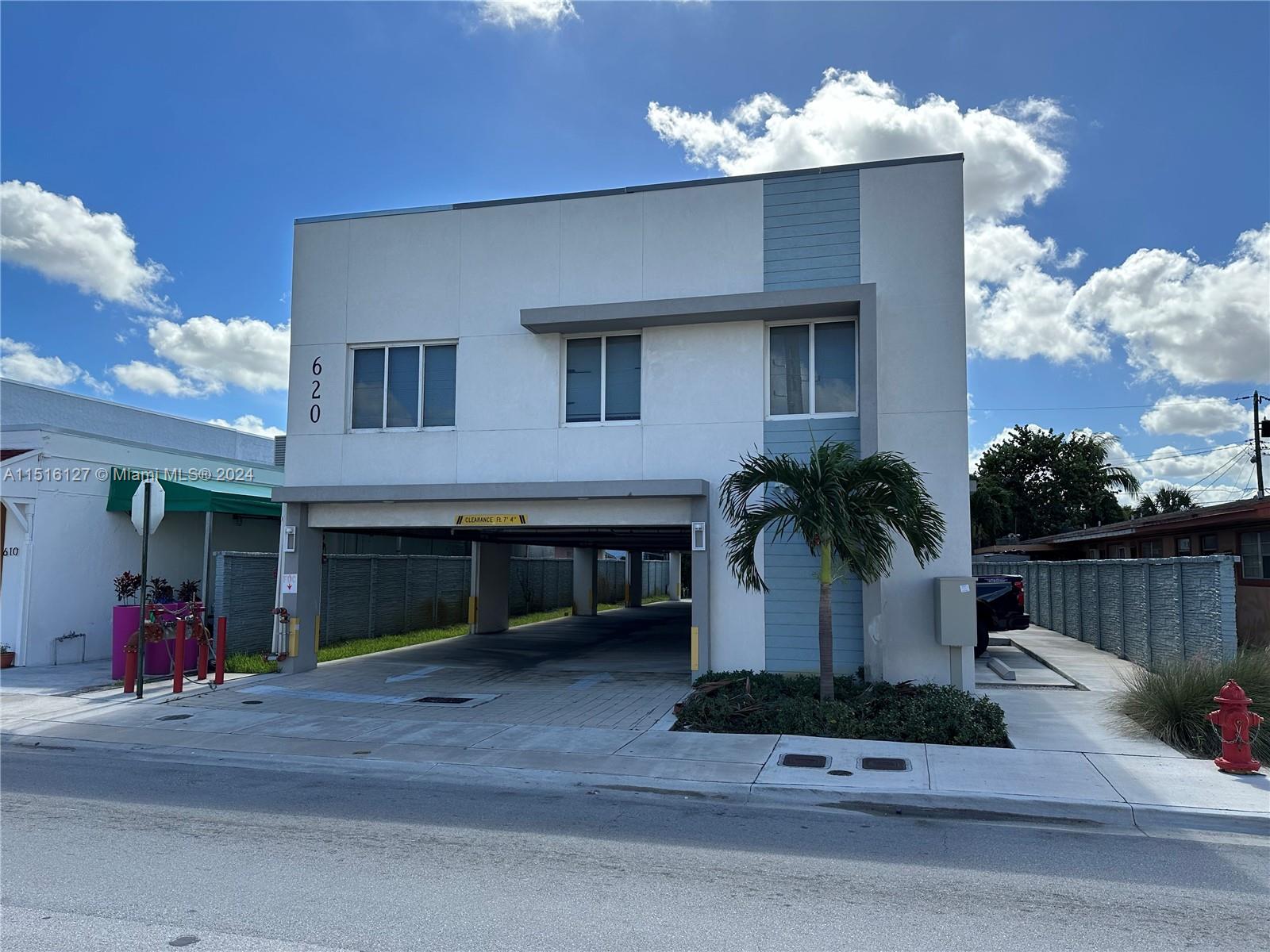 Hialeah Hialeah, FL 33012 - Photo 2 of 10 a front view of a house with garage