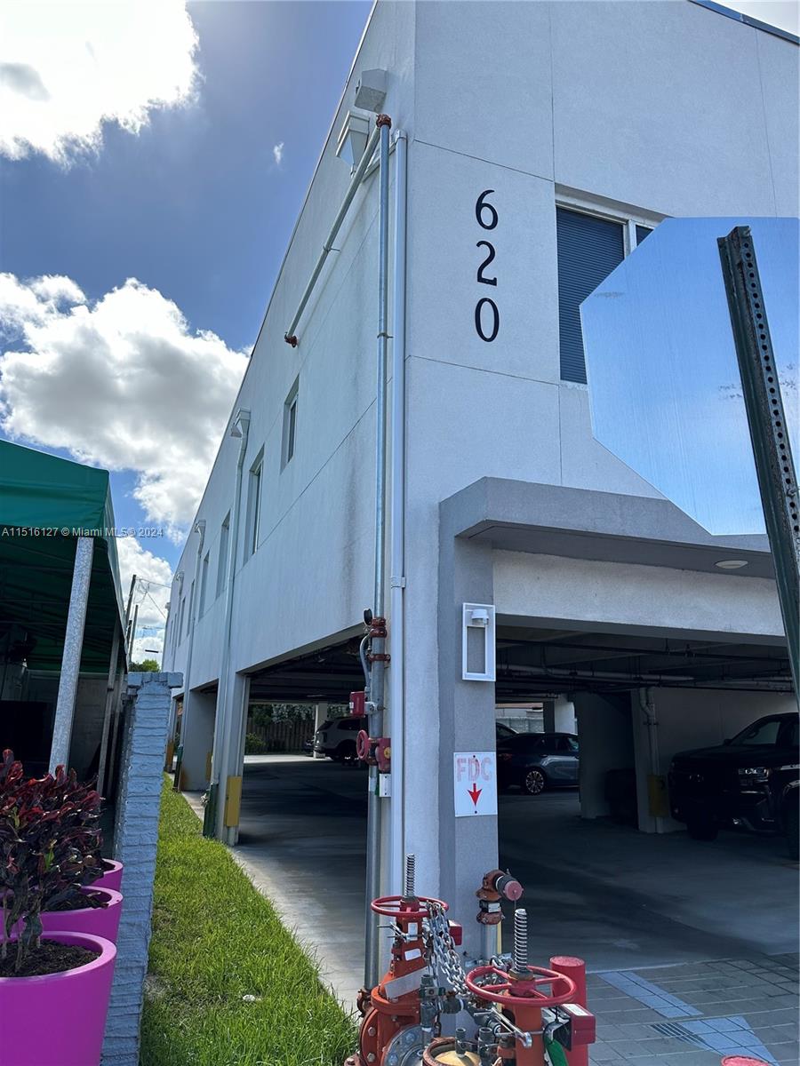 Hialeah Hialeah, FL 33012 - Photo 3 of 10 a car park in front of a house