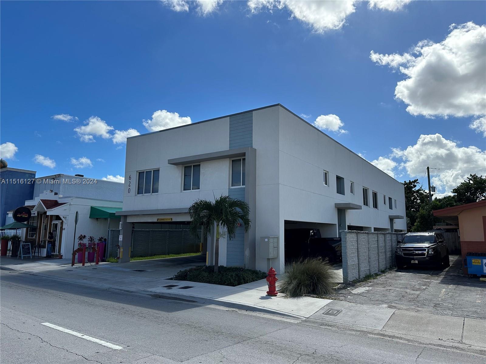 Hialeah Hialeah, FL 33012 - Photo 5 of 10 a front view of a house with a yard