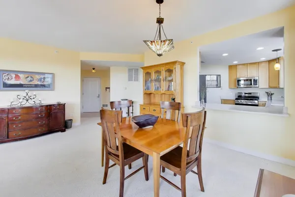 a view of a dining room with furniture