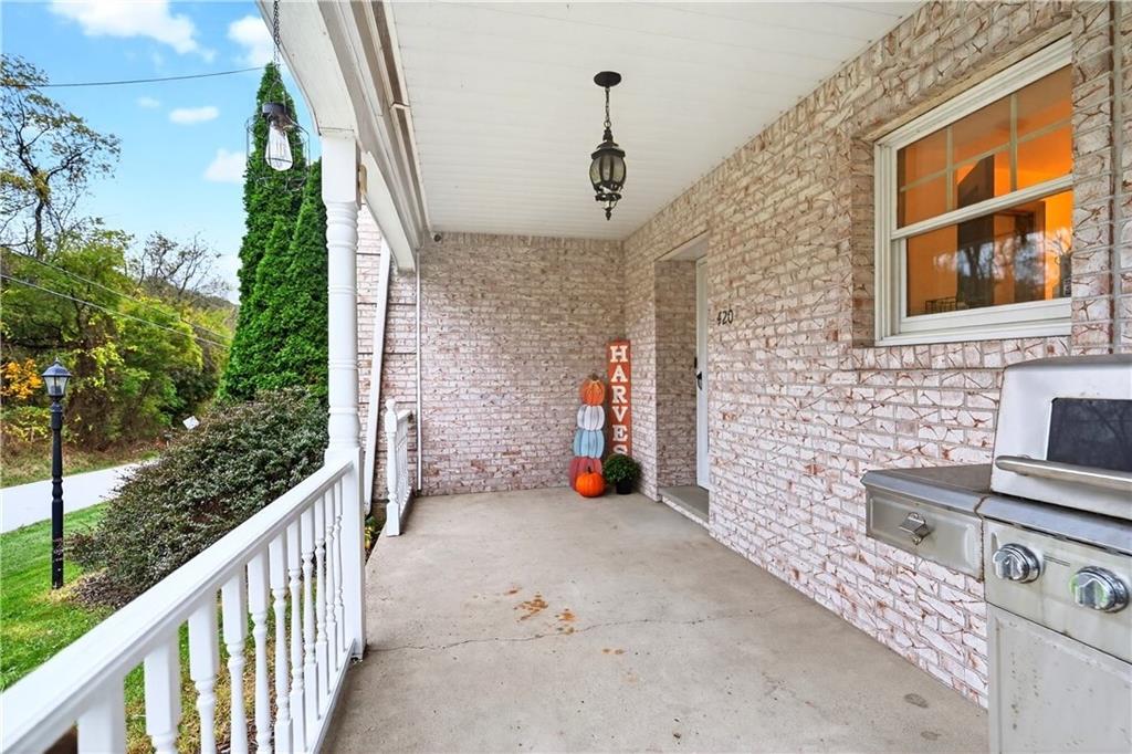 420 Kennedy Road Charleroi, PA 15022 - Photo 27 of 40 a view of a porch with wooden floor and fence