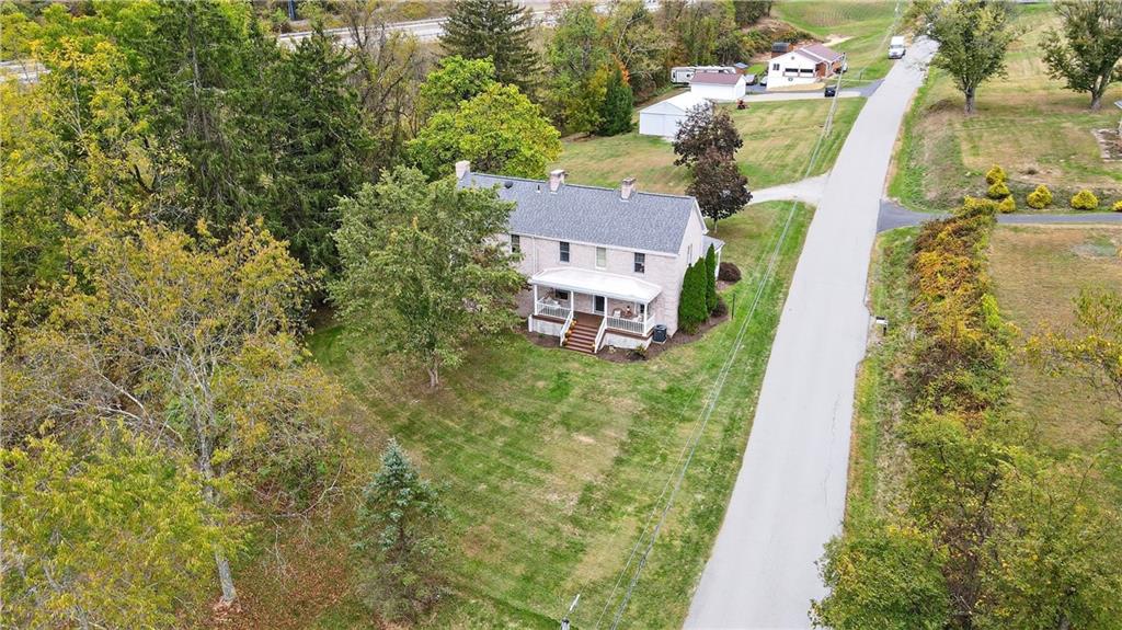 420 Kennedy Road Charleroi, PA 15022 - Photo 28 of 40 an aerial view of a house with swimming pool and large trees