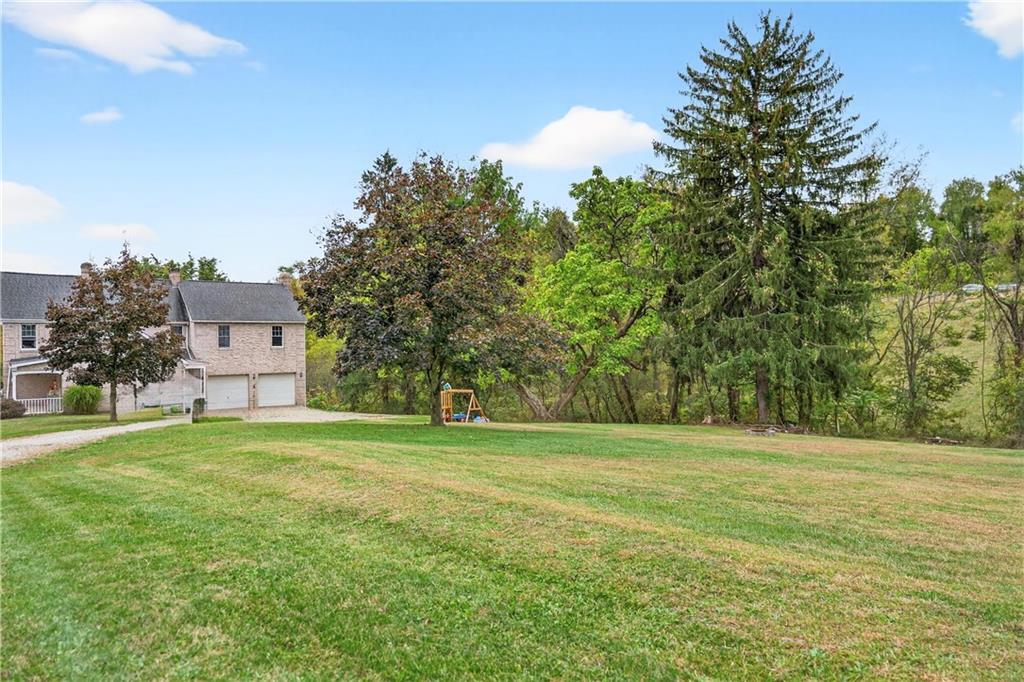 420 Kennedy Road Charleroi, PA 15022 - Photo 36 of 40 a big yard with large trees and a big yard
