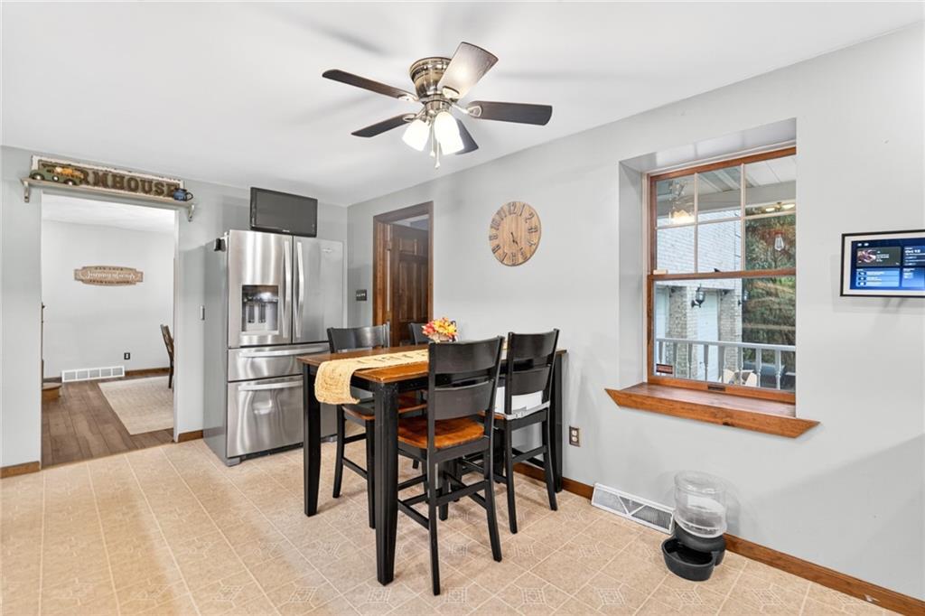 420 Kennedy Road Charleroi, PA 15022 - Photo 4 of 40 a view of a livingroom with furniture and a kitchen view