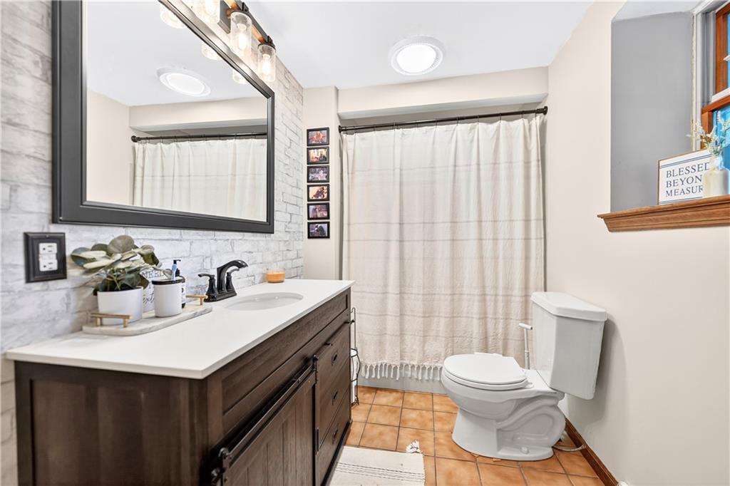 420 Kennedy Road Charleroi, PA 15022 - Photo 9 of 40 a bathroom with a sink a toilet and shower