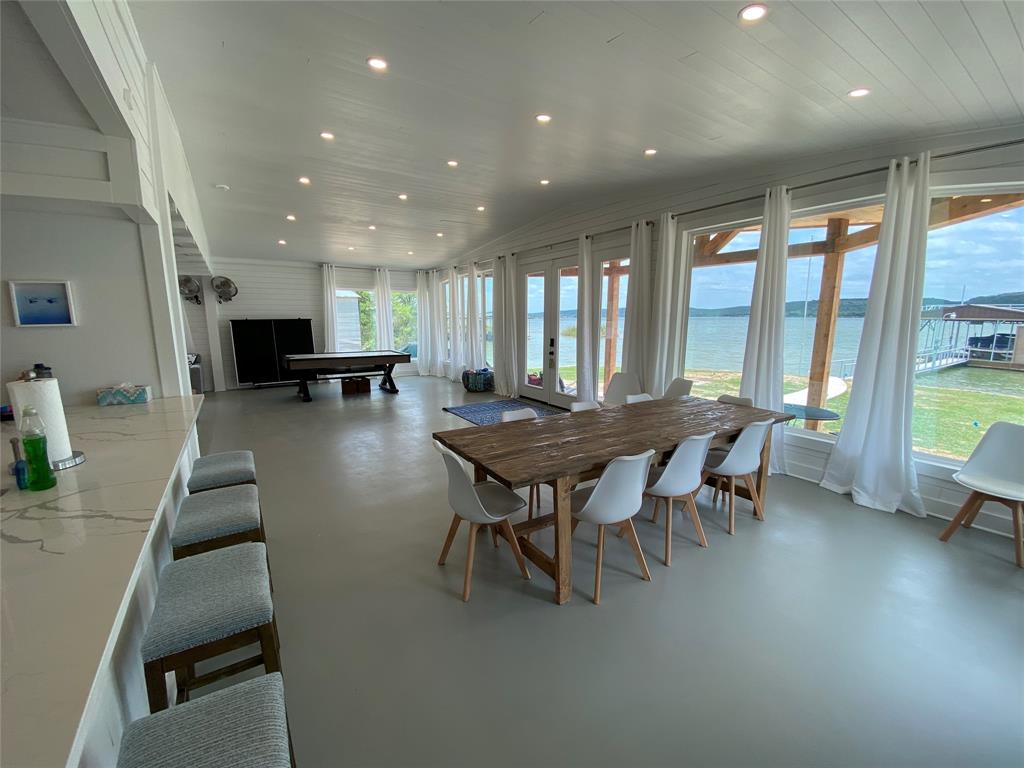 4415 Chapel Road Graham, TX 76450 - Photo 12 of 40 a view of a dining room with furniture and a table