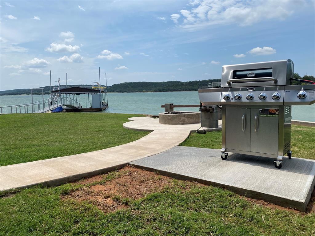 4415 Chapel Road Graham, TX 76450 - Photo 16 of 40 a house view with a garden space