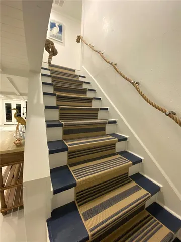 a bathroom with a double vanity sink mirror and