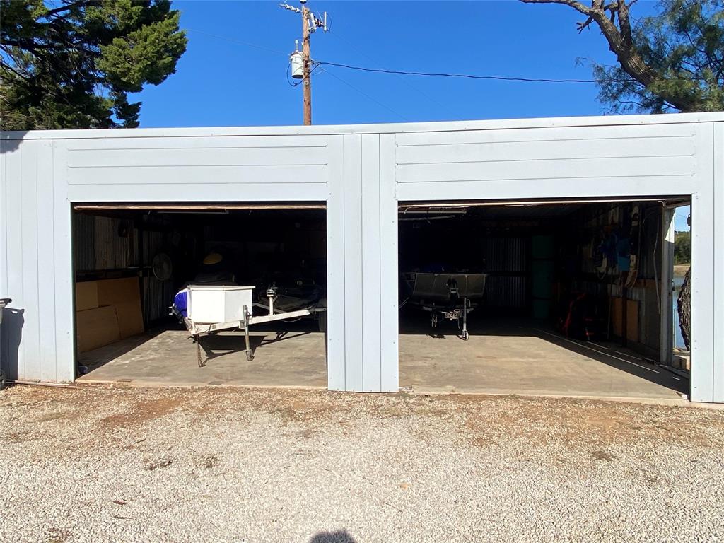 4415 Chapel Road Graham, TX 76450 - Photo 25 of 40 a view of a chairs and fire pit in the patio