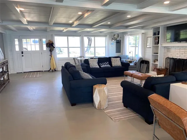 a view of balcony with furniture