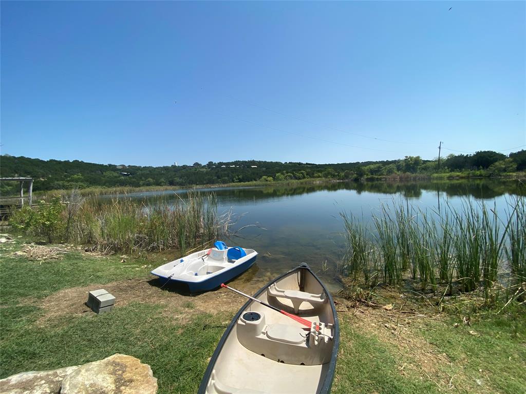 4415 Chapel Road Graham, TX 76450 - Photo 8 of 40 a lake view with a mountain view