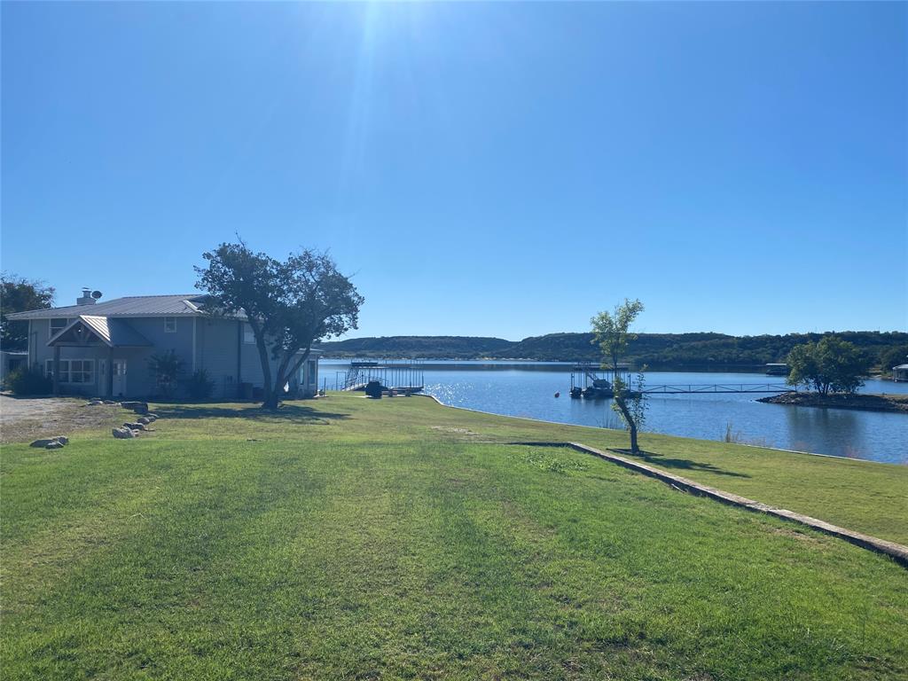 4415 Chapel Road Graham, TX 76450 - Photo 9 of 40 a view of a backyard